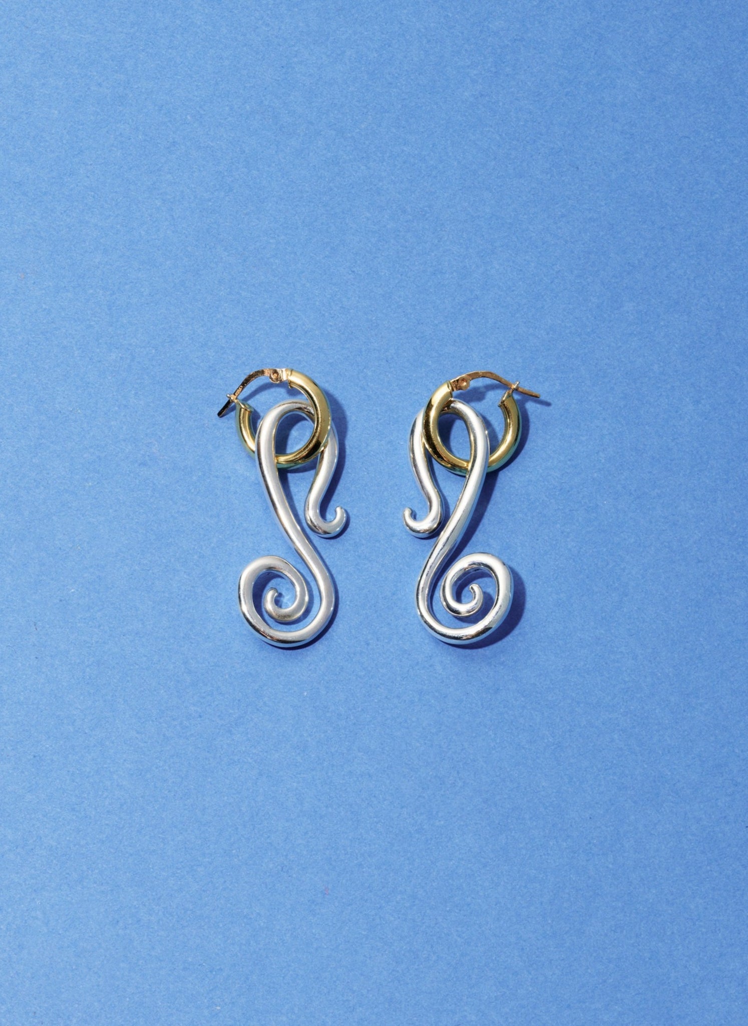 Les boucles d'oreilles Spiral Jetty